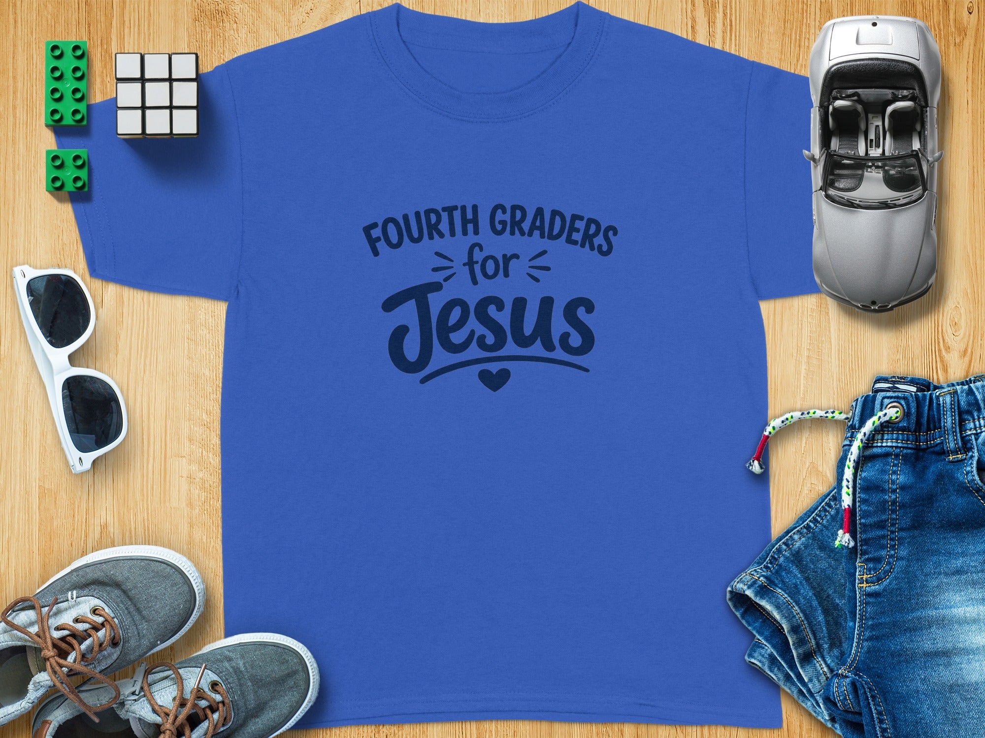 Blue t-shirt with "Fourth Graders for Jesus" text and heart graphic.