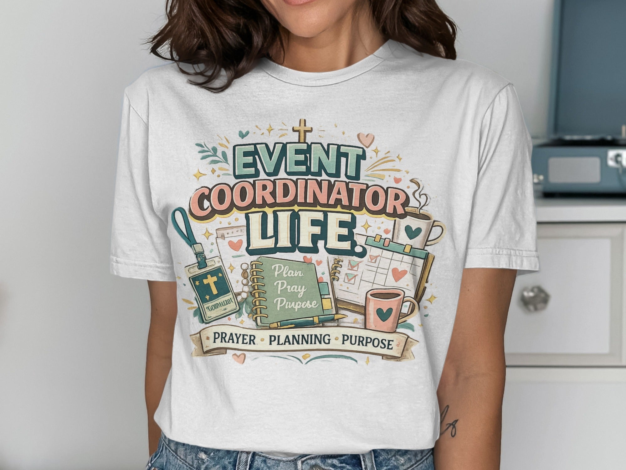 Event Coordinator Life t-shirt with icons for prayer, planning, and purpose.