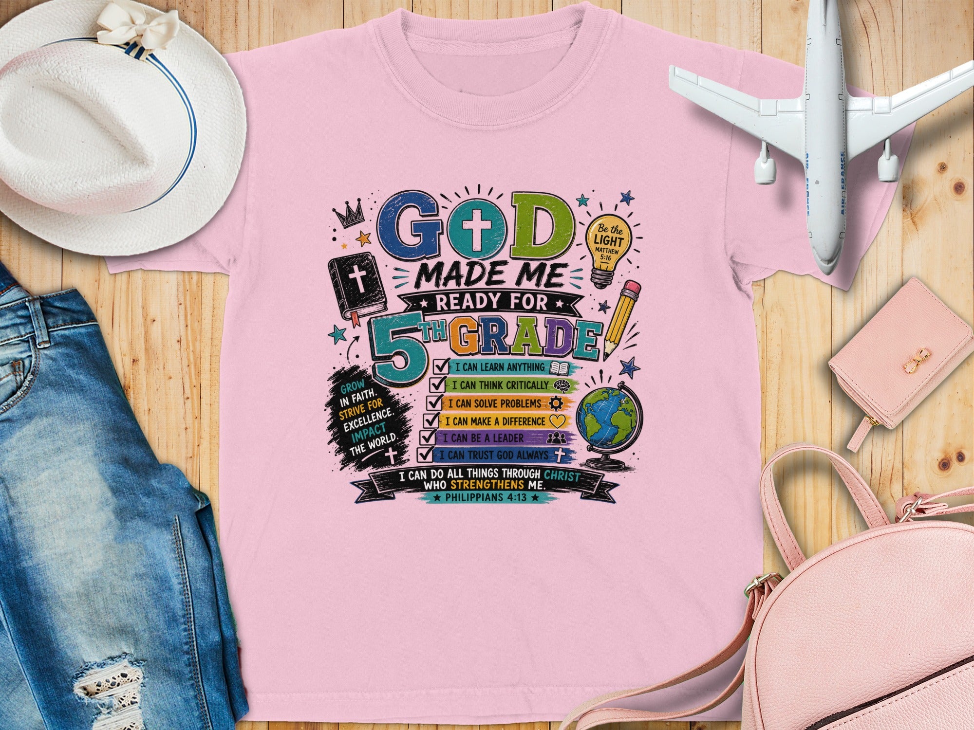 Pink t-shirt with "God made me ready for 5th grade" graphic and Bible verses.