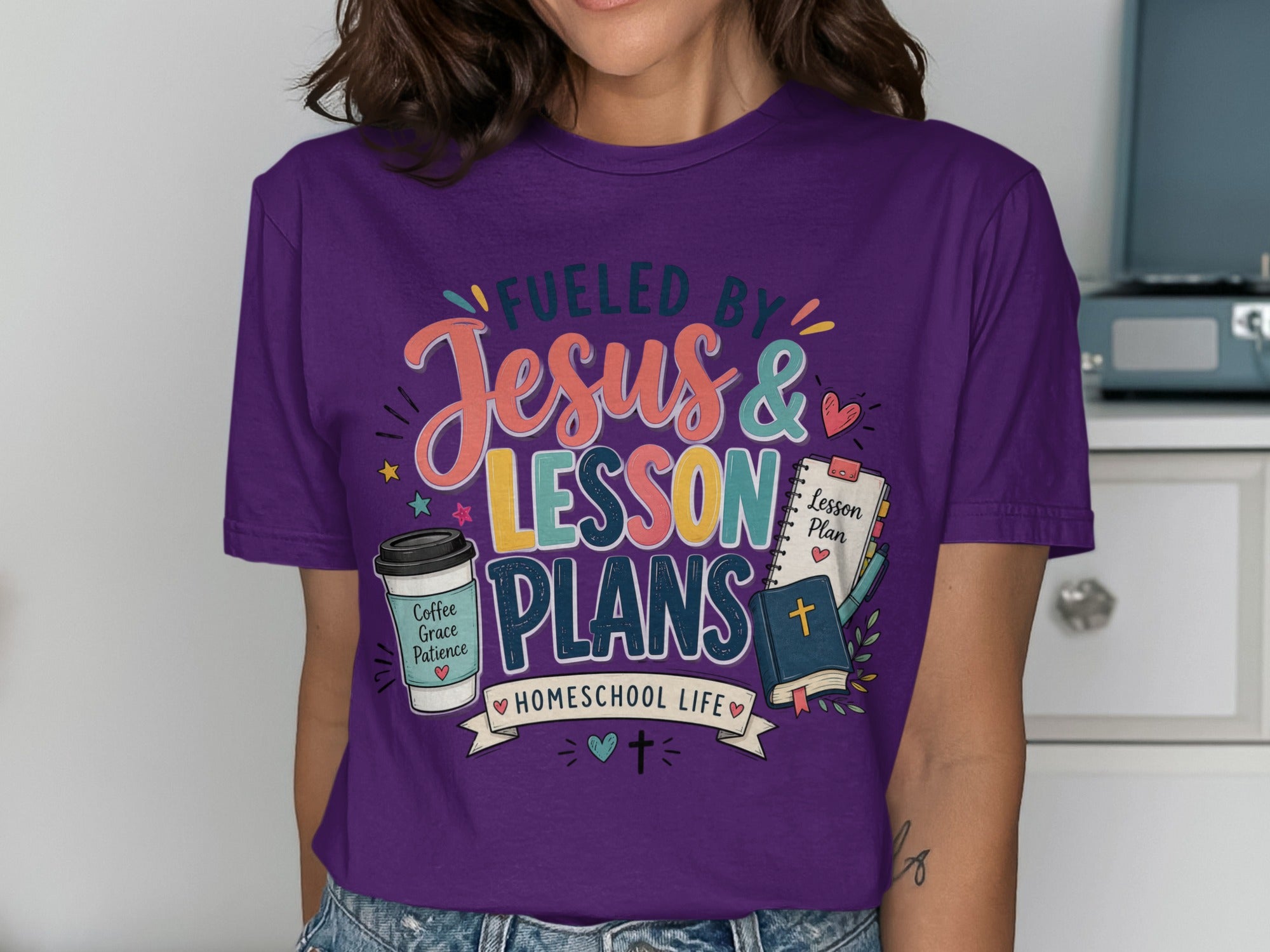 T-shirt with "Fueled by Jesus & Lesson Plans" and homeschool design.