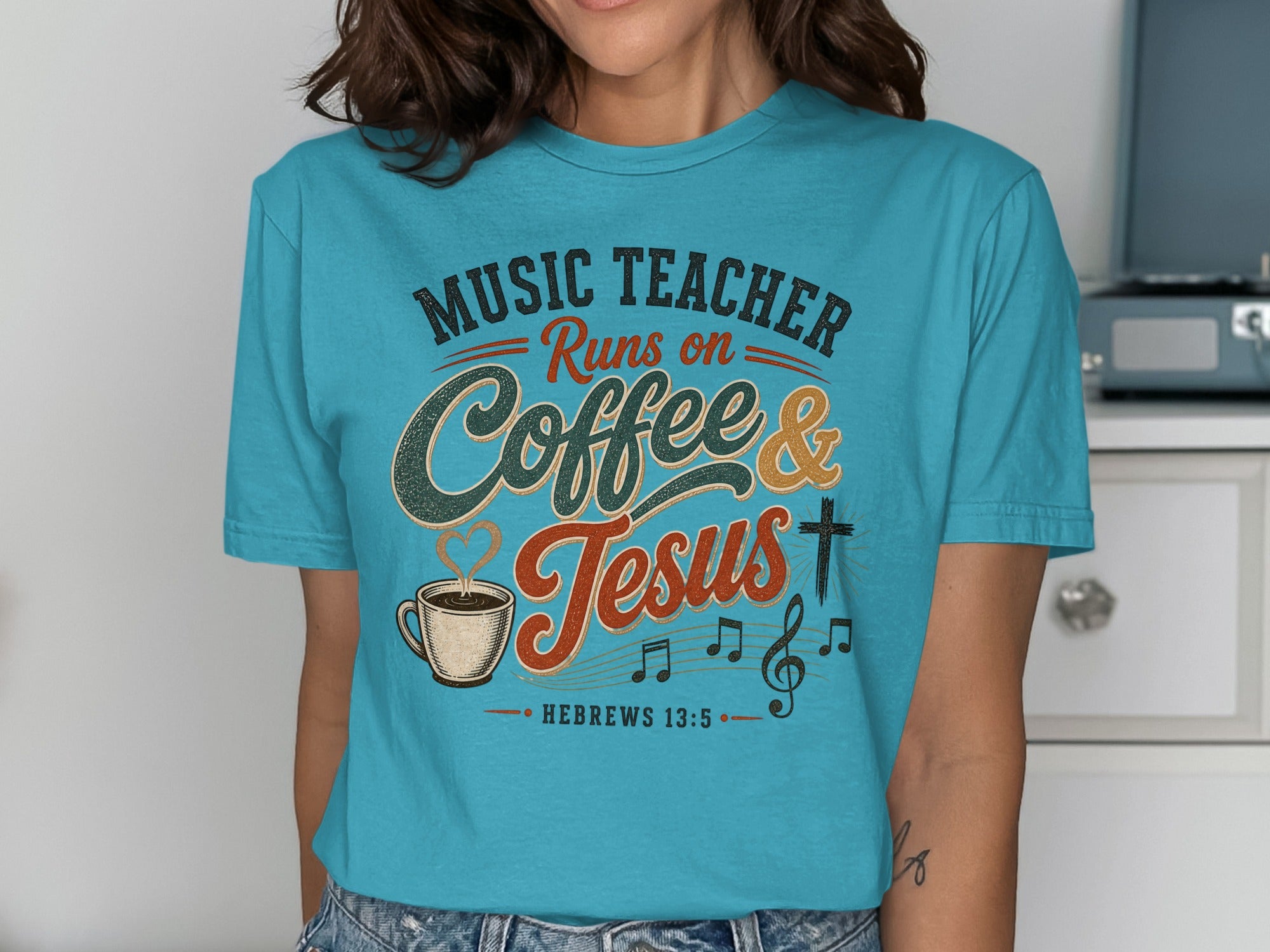 Turquoise t-shirt with "Music Teacher Runs on Coffee & Jesus" text.