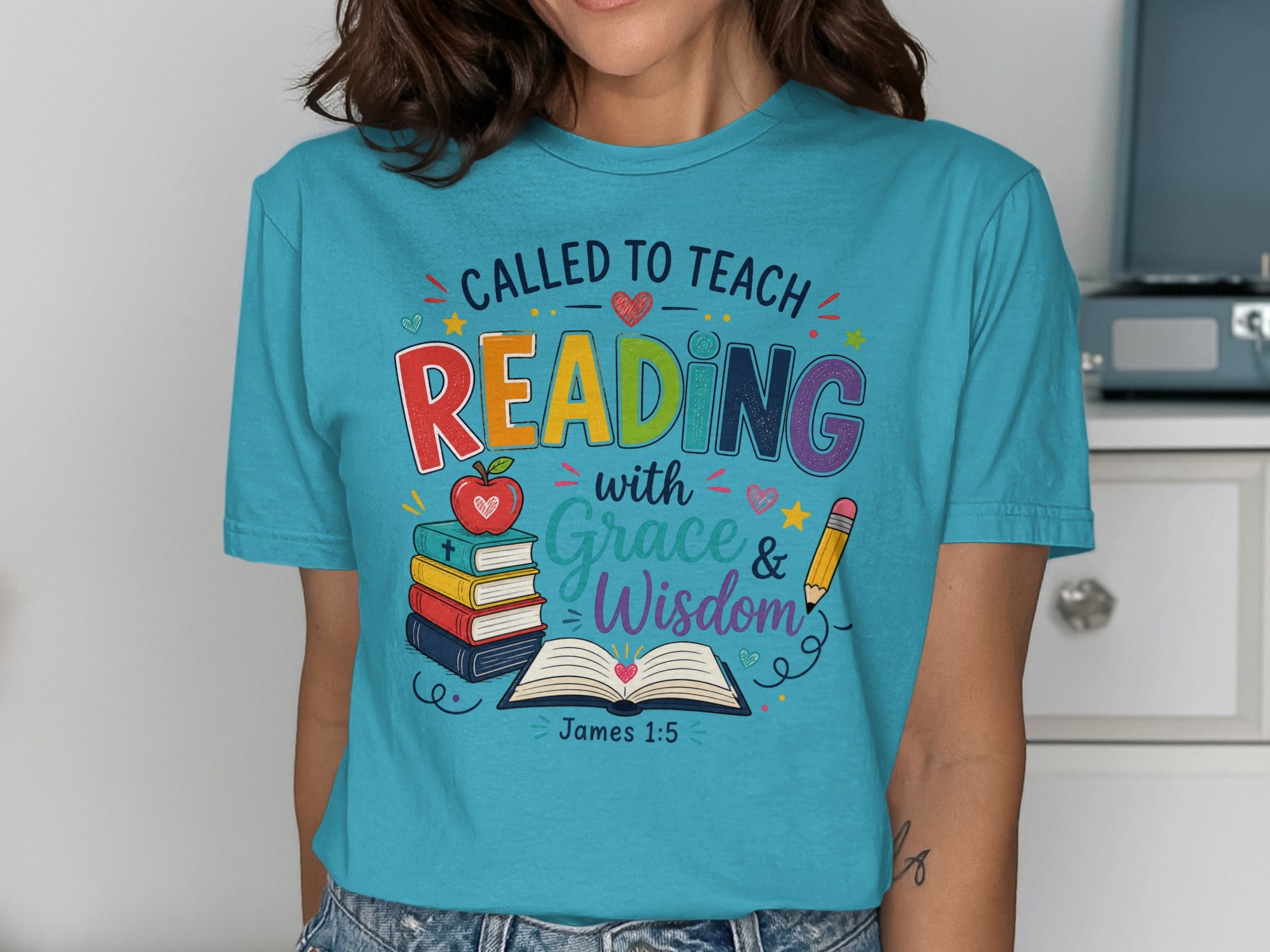 T-shirt with "Called to Teach Reading with Grace & Wisdom" and Bible verse James 1:5.