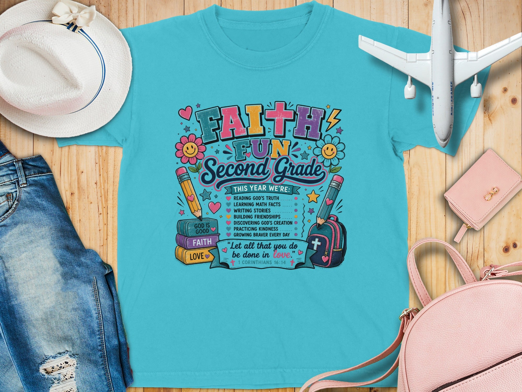 "Faith & Fun" Second Grade t-shirt with list of activities and Bible verse.