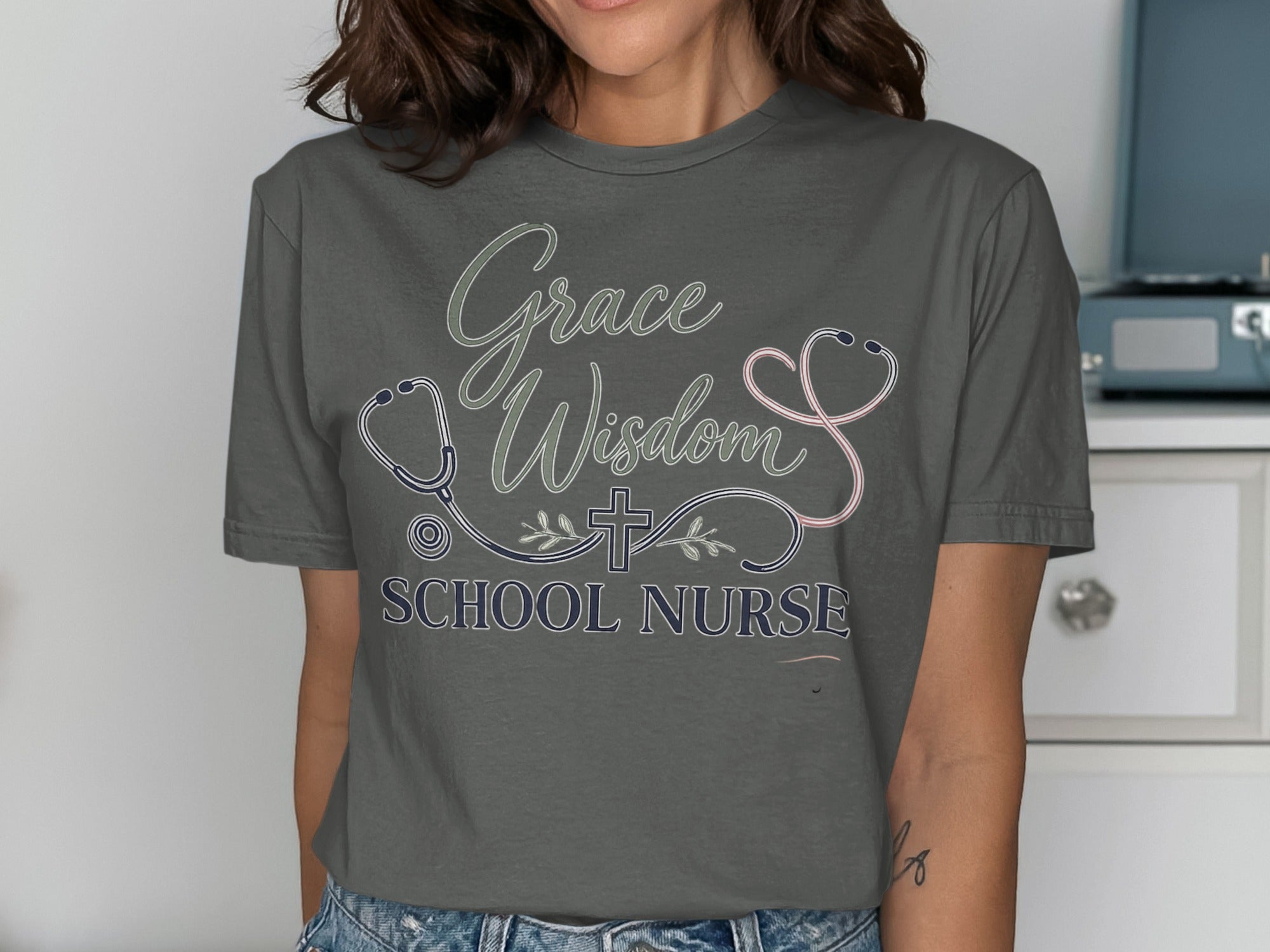Grey t-shirt with "Grace Wisdom SCHOOL NURSE" and stethoscope design.
