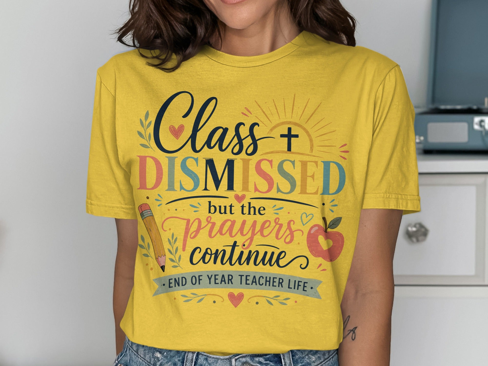 "Class Dismissed but the prayers continue" graphic tee with apple and pencil.