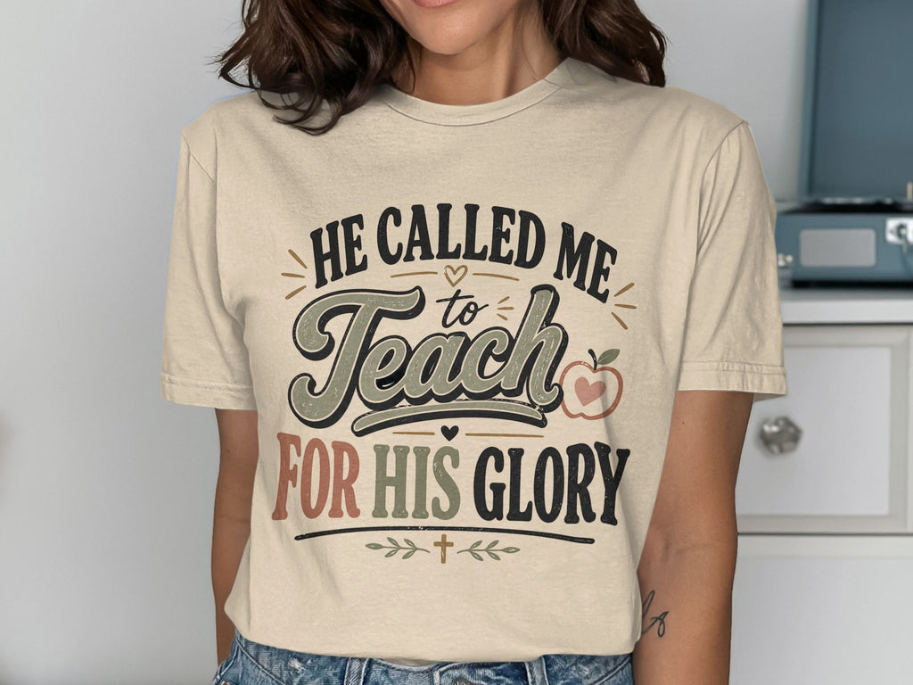 T-shirt with text "HE CALLED ME to TEACH FOR HIS GLORY" and an apple graphic.