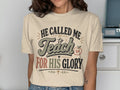 T-shirt with text "HE CALLED ME to TEACH FOR HIS GLORY" and an apple graphic.