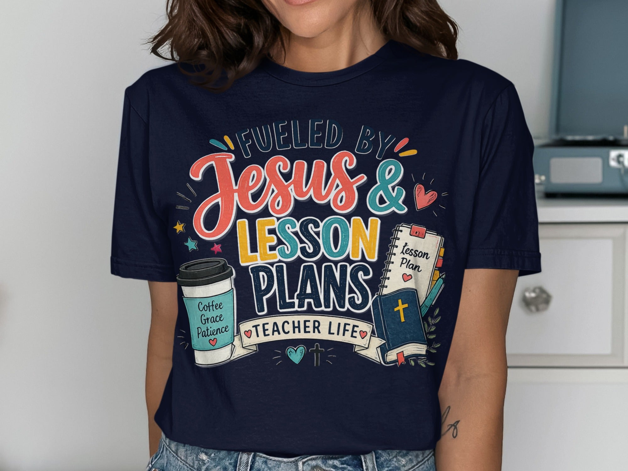 T-shirt with "Fueled by Jesus & Lesson Plans" and "Teacher Life" text.