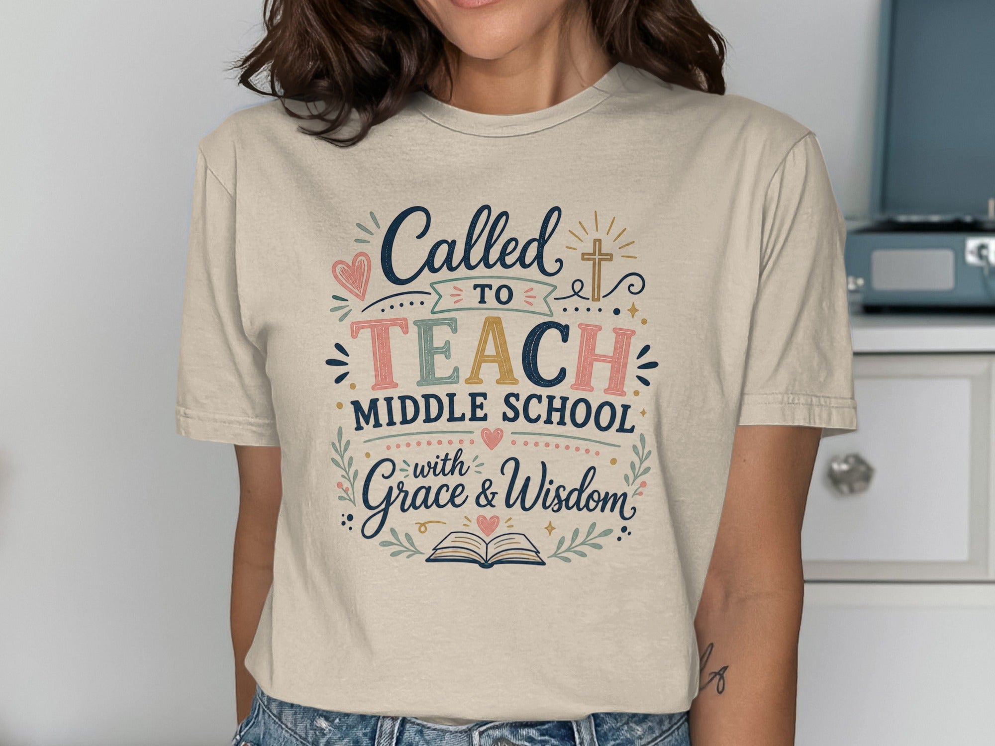 T-shirt with "Called to Teach Middle School with Grace & Wisdom" text and heart.