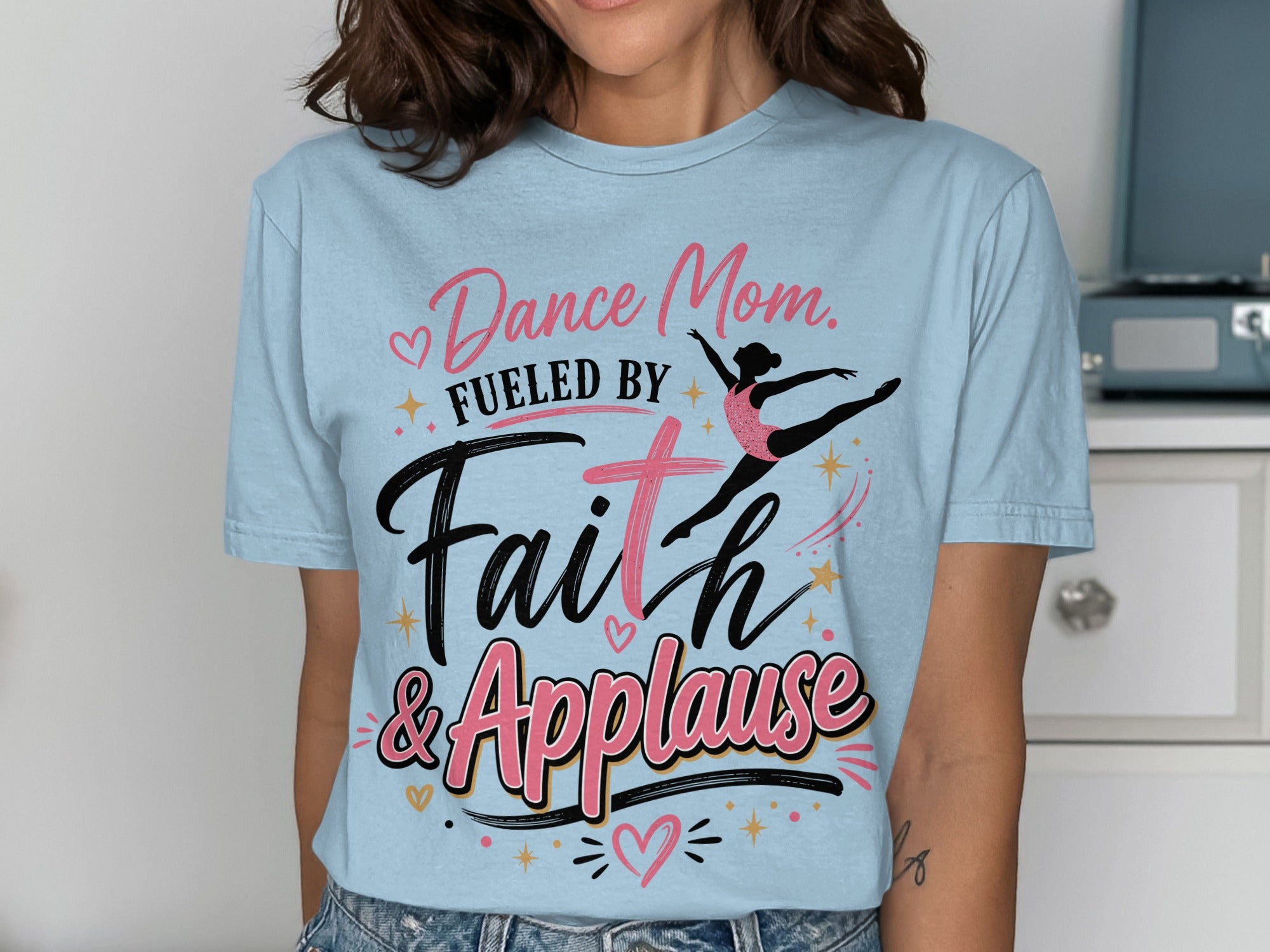 Light blue t-shirt with "Dance Mom. Fueled by Faith & Applause" and a dancer graphic.