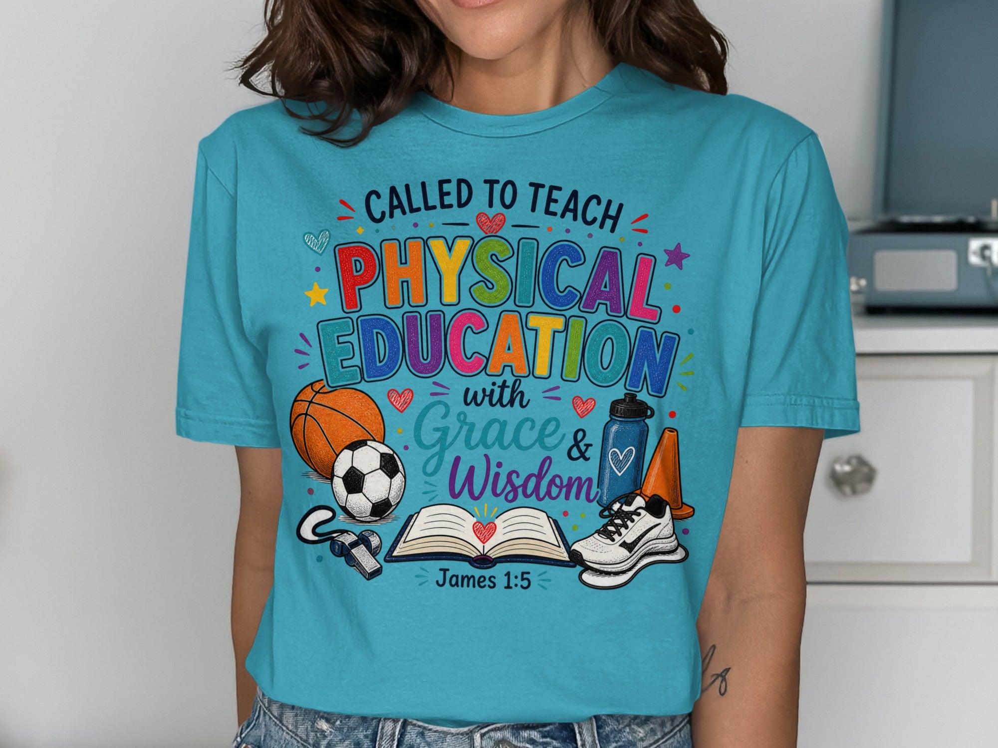 T-shirt with "Called to Teach Physical Education with Grace & Wisdom" and Bible verse.