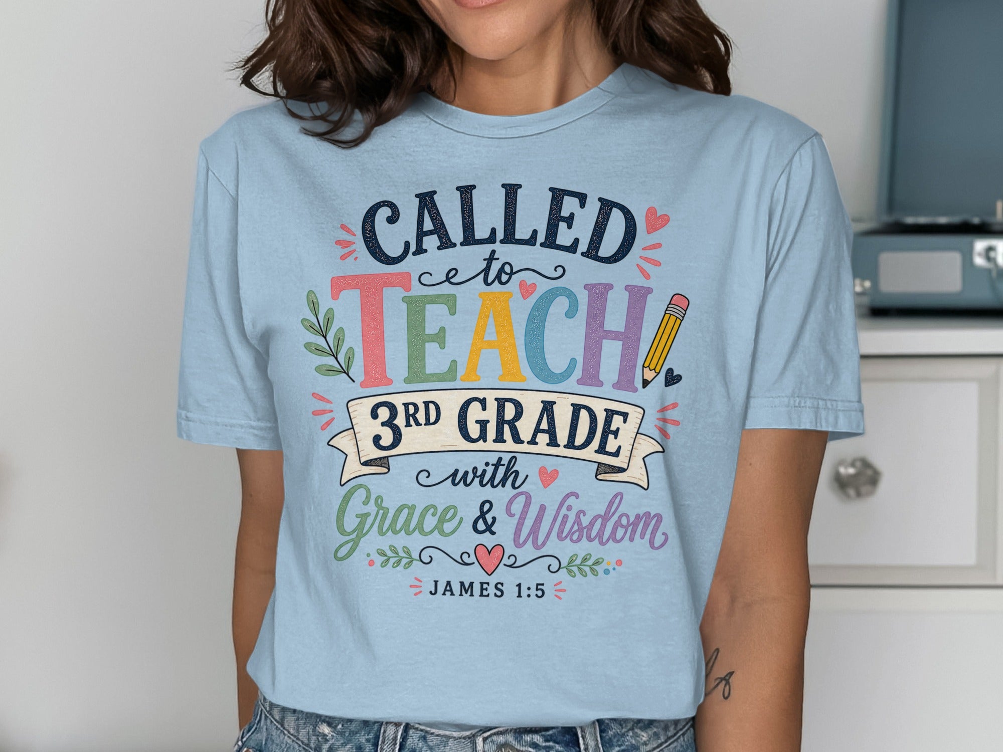 Light blue t-shirt with "Called to Teach 3rd Grade with Grace & Wisdom" text.