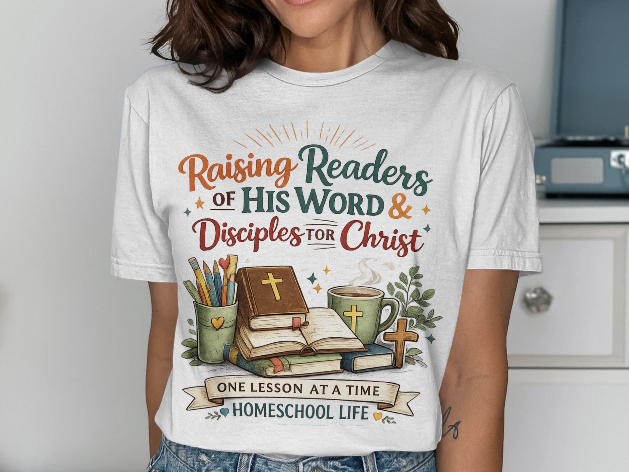 T-shirt with "Raising Readers of His Word & Disciples for Christ" design.