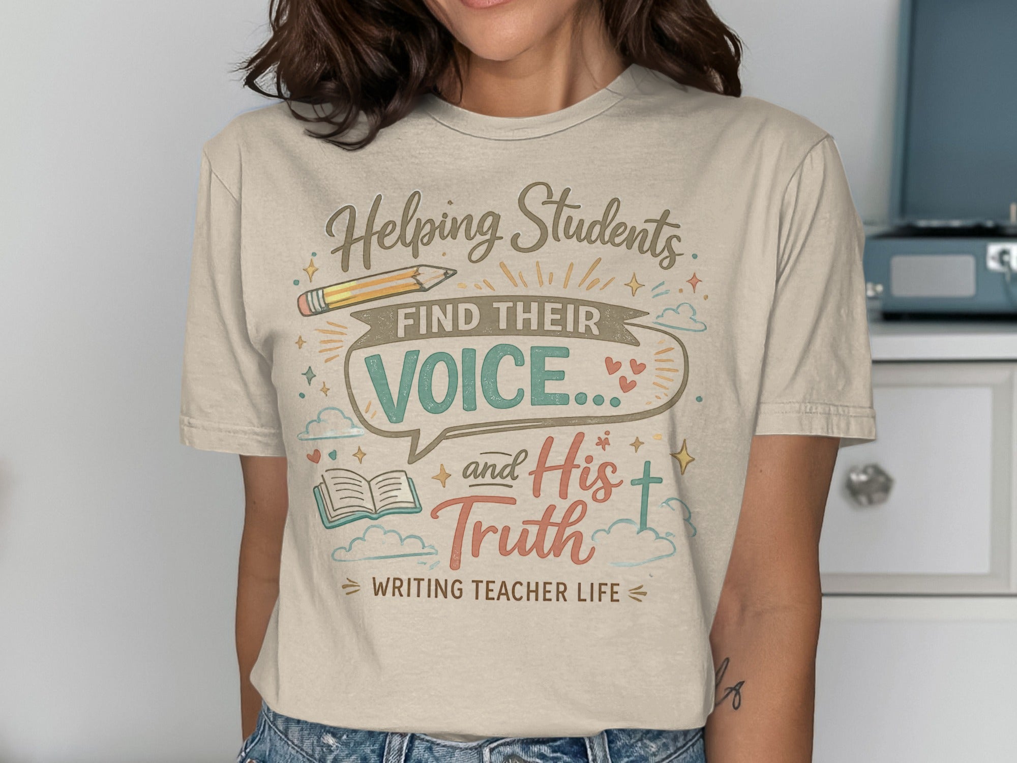 T-shirt with text "Helping Students FIND THEIR VOICE... and His Truth WRITING TEACHER LIFE".