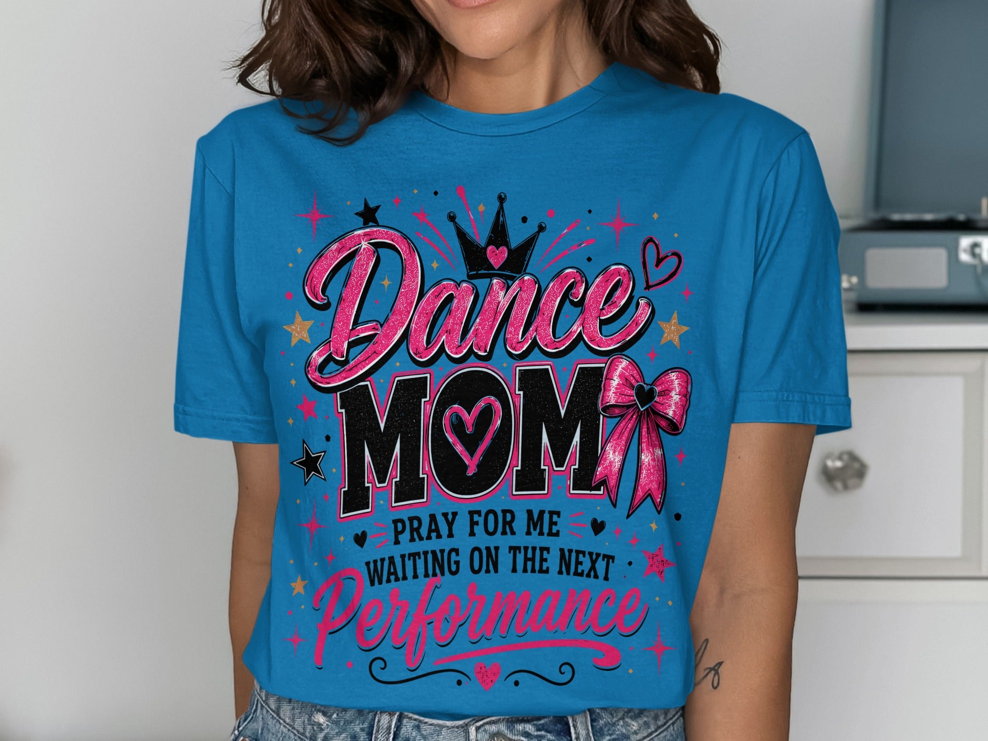 Blue t-shirt with "Dance Mom" design featuring crown, heart, stars, and bow.