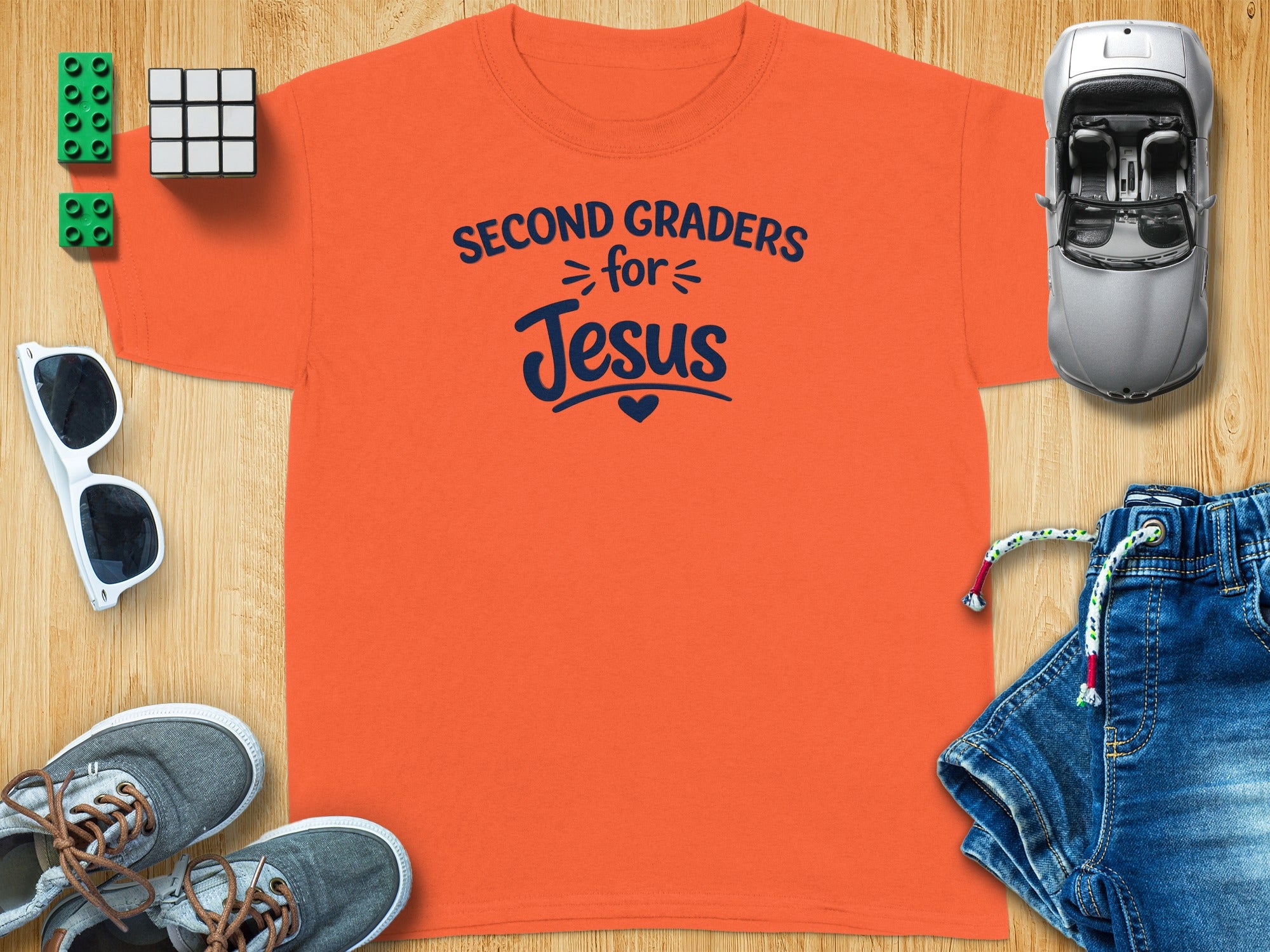 Orange t-shirt with "Second Graders for Jesus" text and heart graphic.