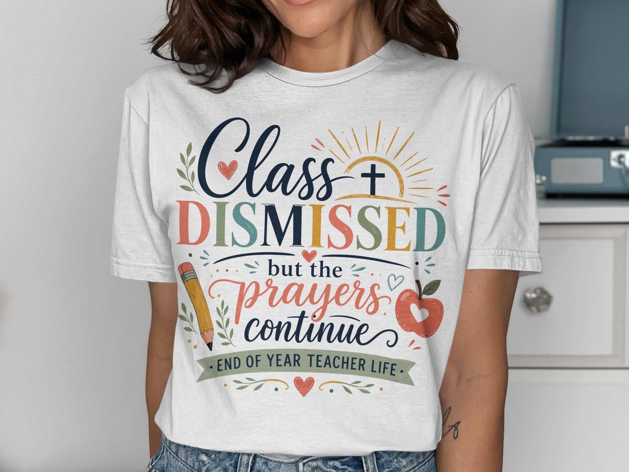 White t-shirt with "Class Dismissed but the prayers continue" text.