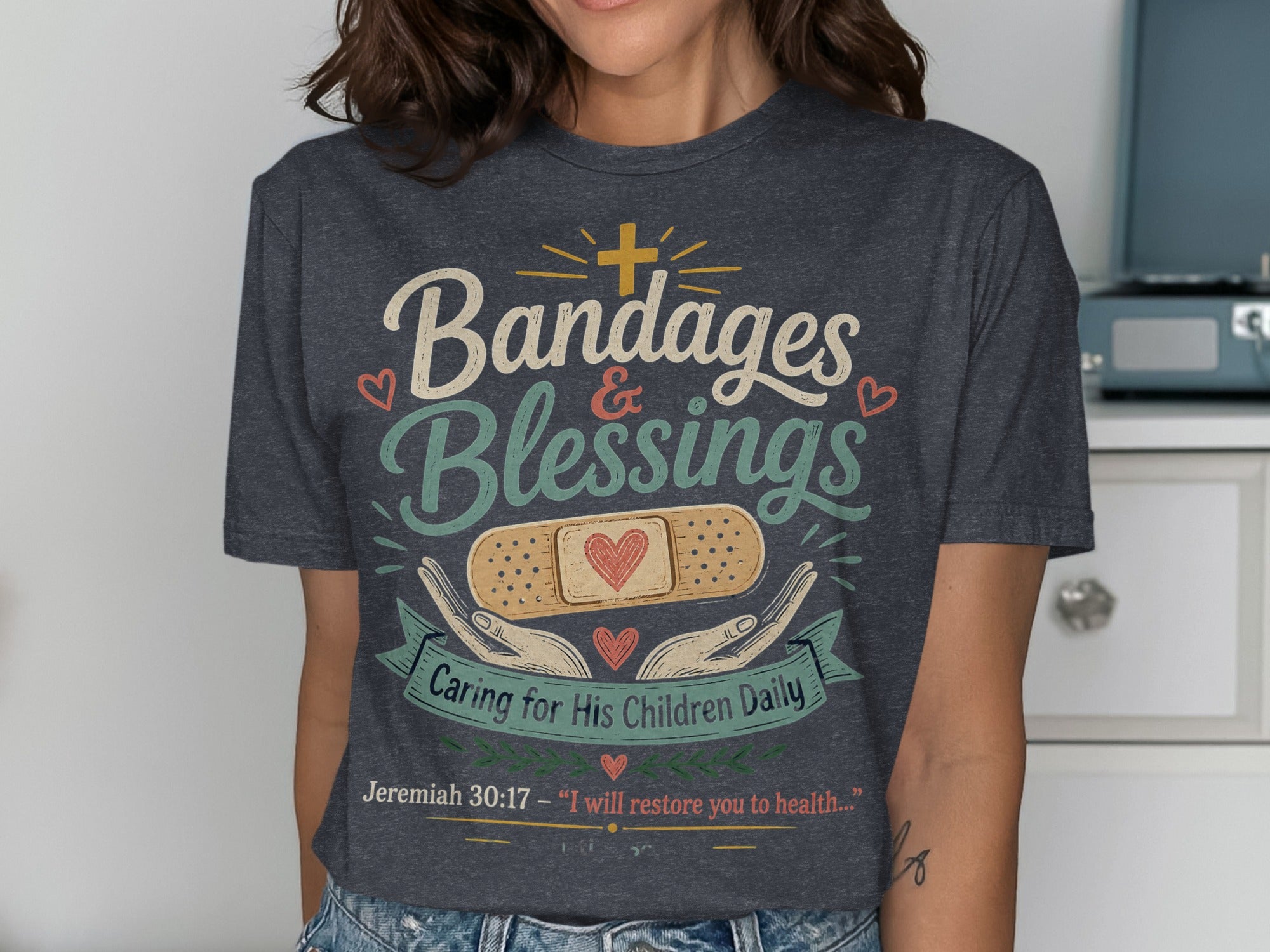 Dark t-shirt with "Bandages & Blessings" and biblical quote.