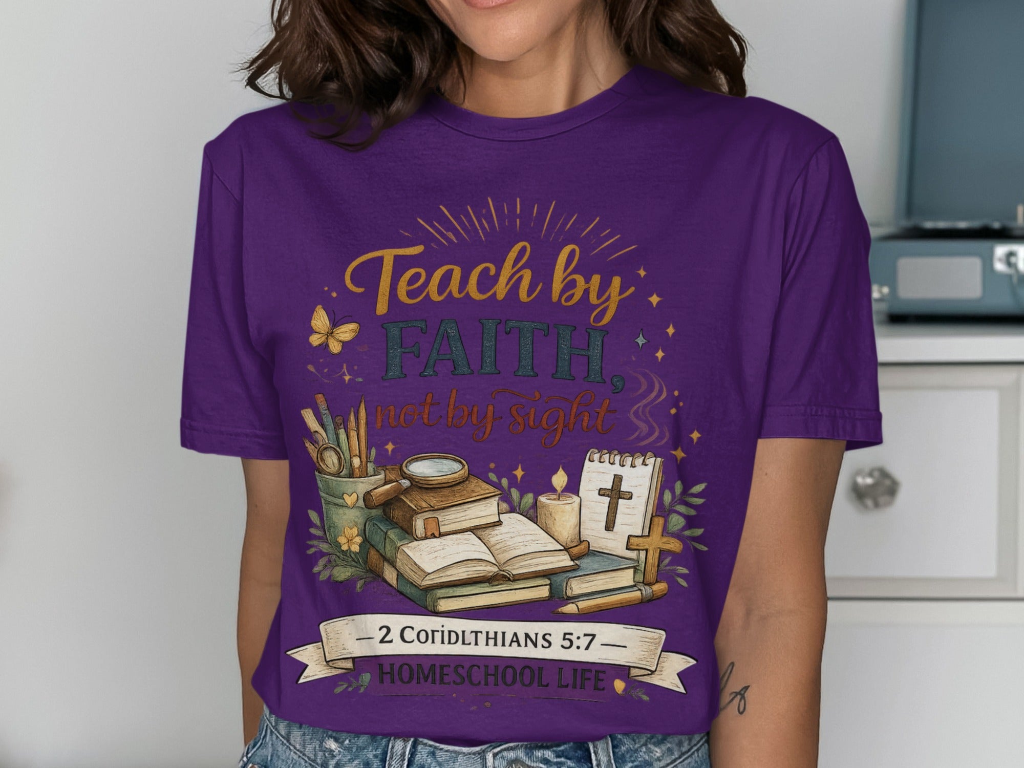 Purple t-shirt with "Teach by Faith, not by sight" and a cross.