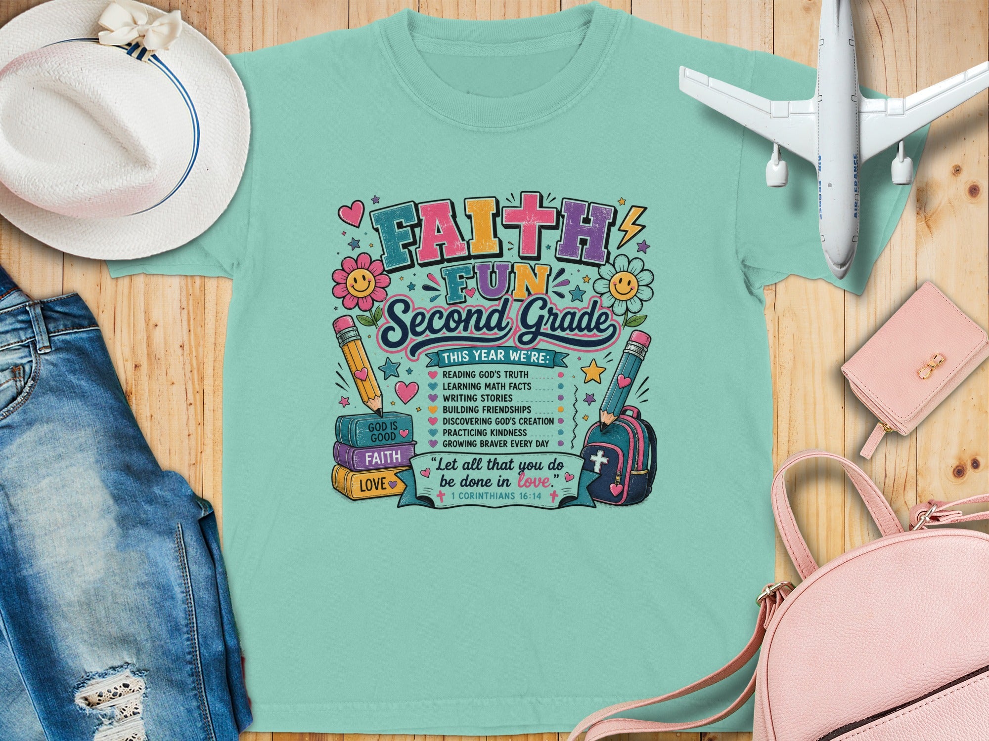 T-shirt with "Faith & Fun Second Grade" graphic and list of activities.