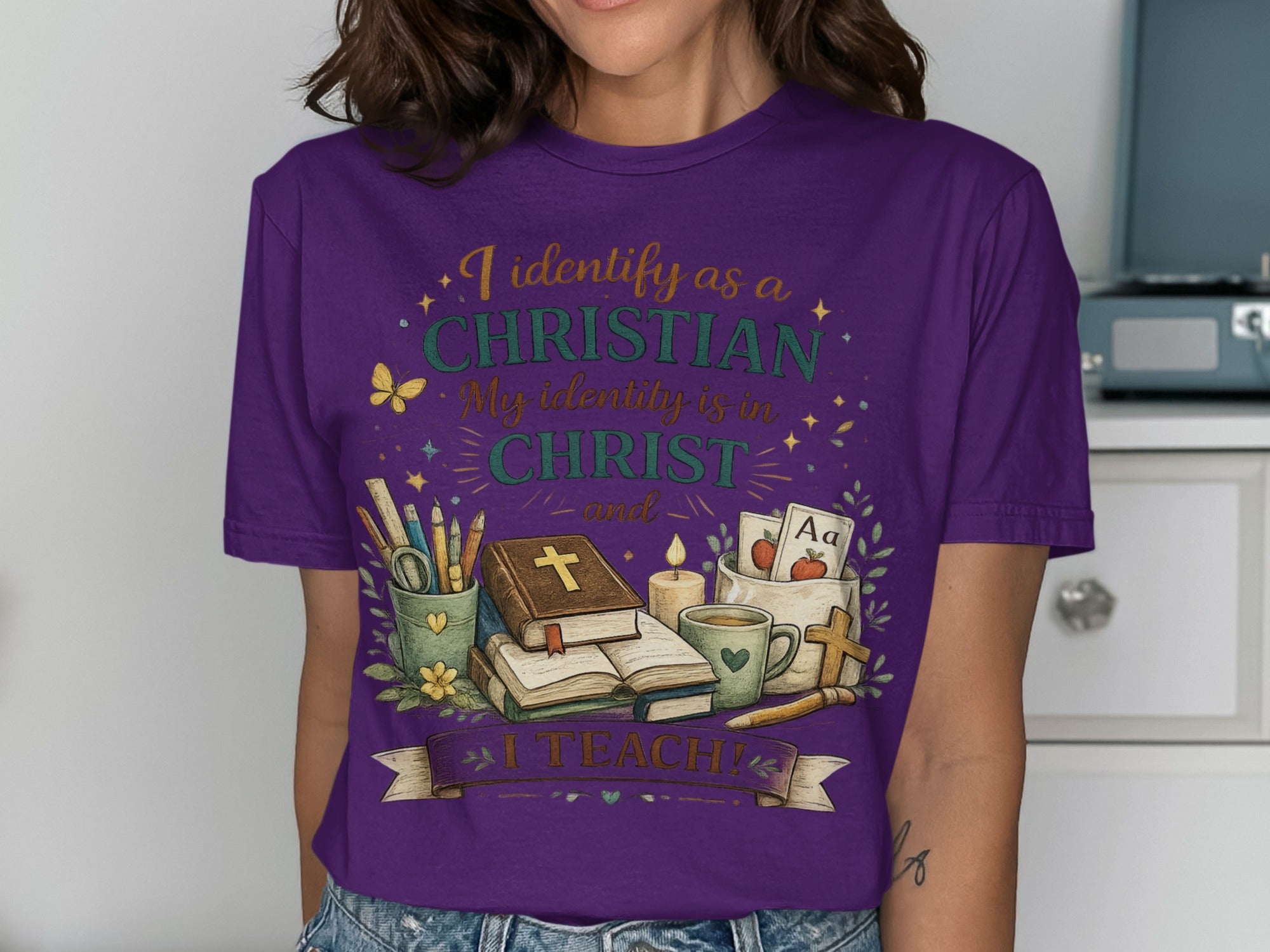 Purple t-shirt with "I Identify as a Christian" text and school supplies.