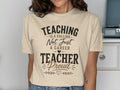 T-shirt with text "Teaching is a calling, not just a career. Teacher proud."