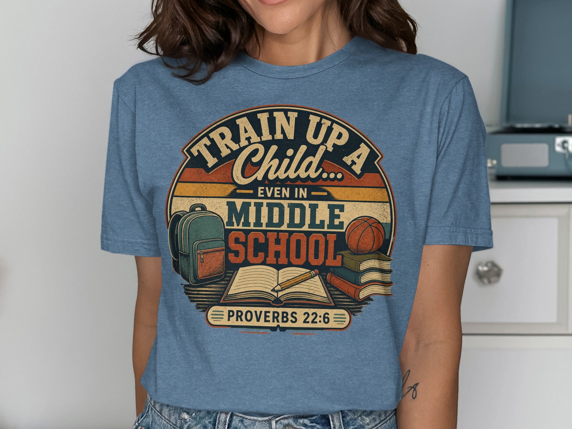 T-shirt with "Train Up a Child" and "Middle School Proverbs 22:6" text.