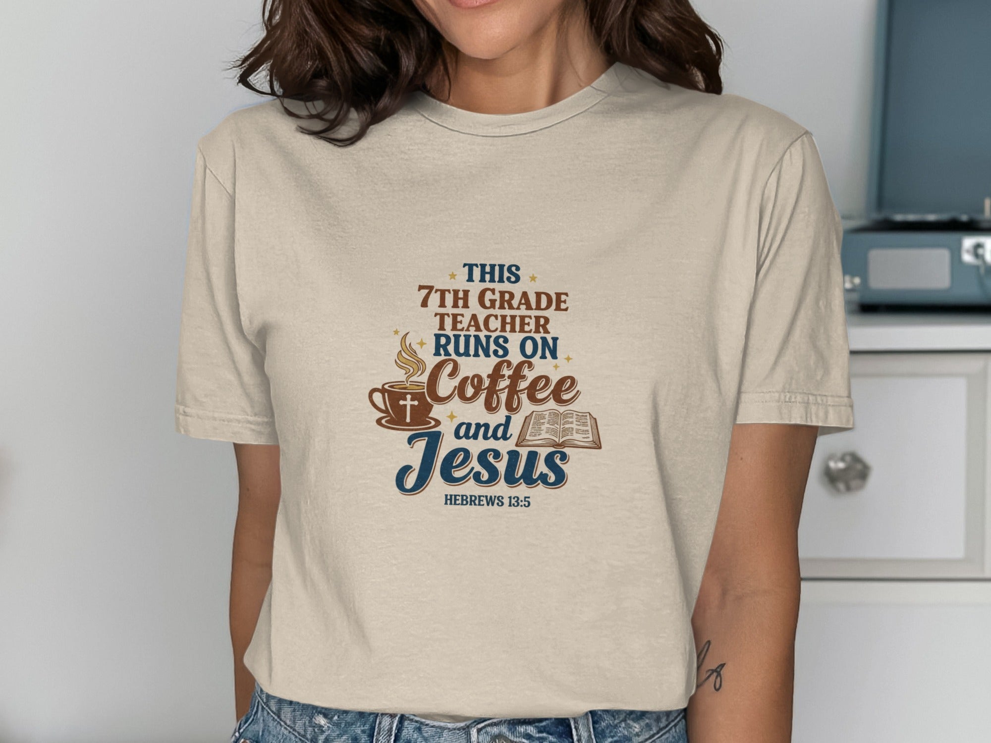 Beige t-shirt with "This 7th Grade Teacher Runs on Coffee and Jesus" text.